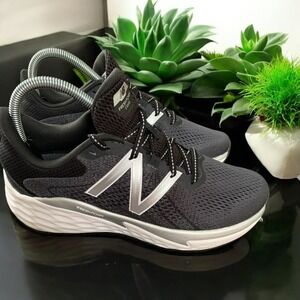 New Balance Black and Silver Athletic Shoes